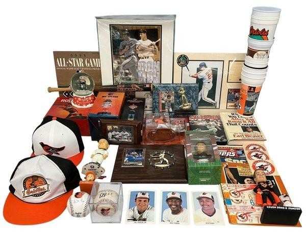 Orioles memorabilia including Cal Ripken Iron Men print, caps, baseballs, bobbleheads, plaques and photo cards